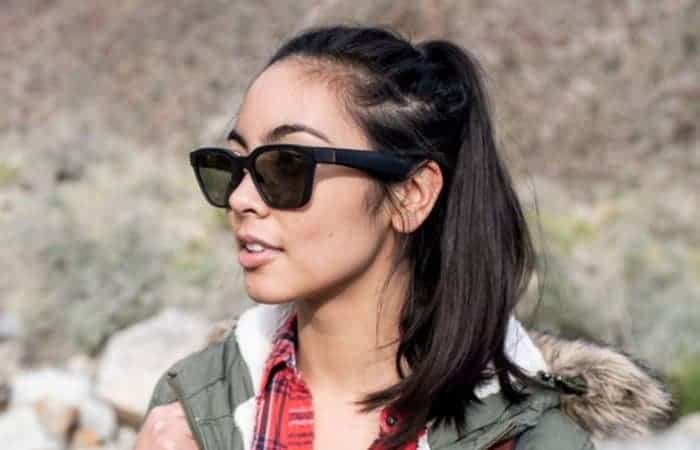 girl wearing bose audio sunglasses